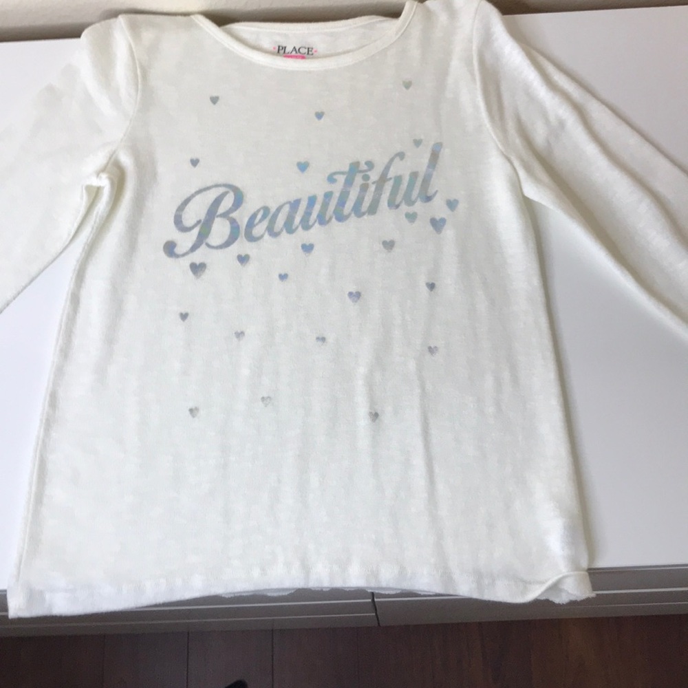 white long sleeved sweater
